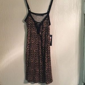 Cheetah print slip dress with lace up front design